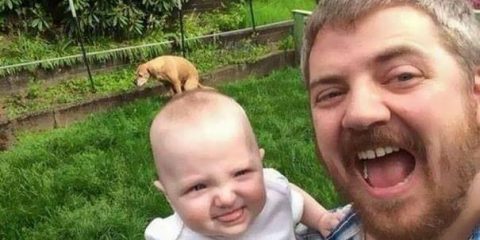 Photo of me and my boy... and my dog taking a dump.